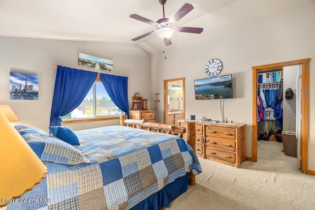 8558 N Boysenberry Loop, Hayden, ID 83835 - carpeted bedroom featuring a spacious closet, lofted ceiling, a closet, a ceiling fan, and connected bathroom
