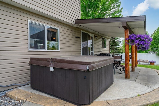 8558 N Boysenberry Loop, Hayden, ID 83835 - view of patio / terrace with a hot tub