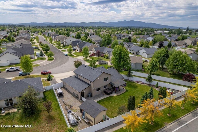 8558 N Boysenberry Loop, Hayden, ID 83835 - aerial perspective of suburban area featuring a mountainous background