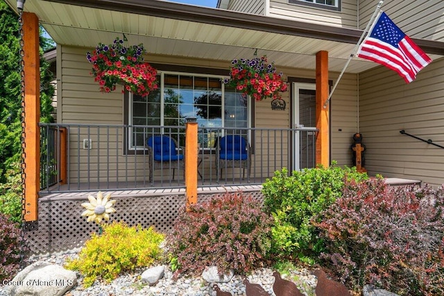 8558 N Boysenberry Loop, Hayden, ID 83835 - view of exterior entry with a porch
