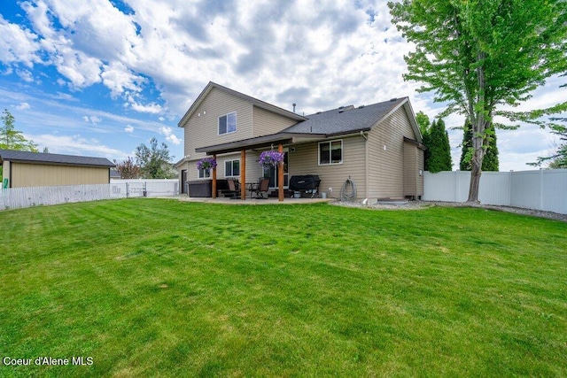 8558 N Boysenberry Loop, Hayden, ID 83835 - rear view of property featuring a patio area