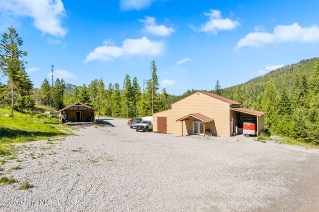 1446 Sagle Creek Rd, Sagle, ID 83860 - view of pole building with a forest view