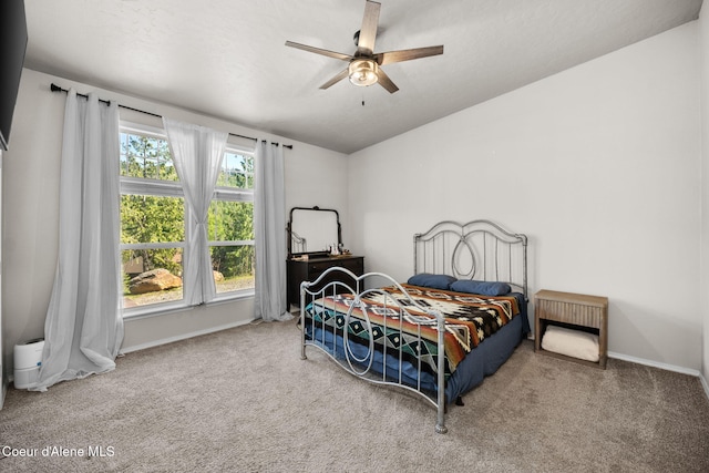 1446 Sagle Creek Rd, Sagle, ID 83860 - bedroom featuring carpet floors, baseboards, and ceiling fan