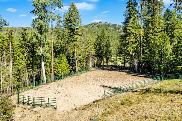 1446 Sagle Creek Rd, Sagle, ID 83860 - surrounding community with a wooded view and an enclosed riding area