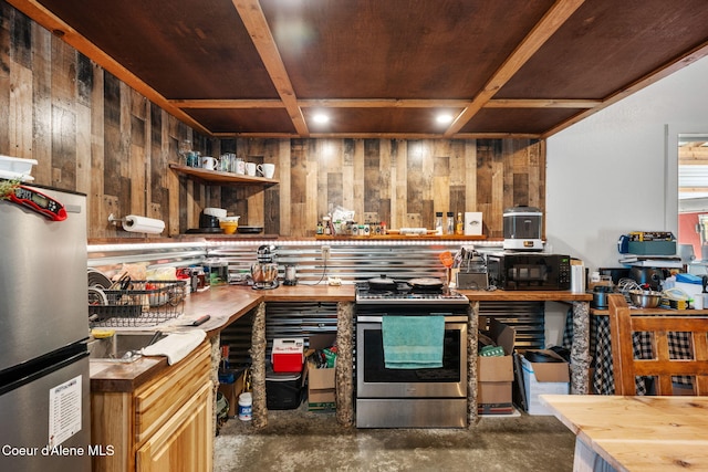 1446 Sagle Creek Rd, Sagle, ID 83860 - kitchen with butcher block counters, stainless steel appliances, wood walls, wooden ceiling, and concrete flooring