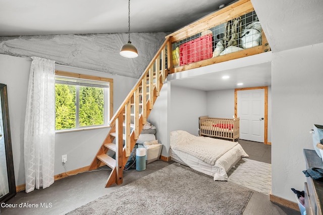 1446 Sagle Creek Rd, Sagle, ID 83860 - bedroom with a towering ceiling, baseboards, and concrete flooring