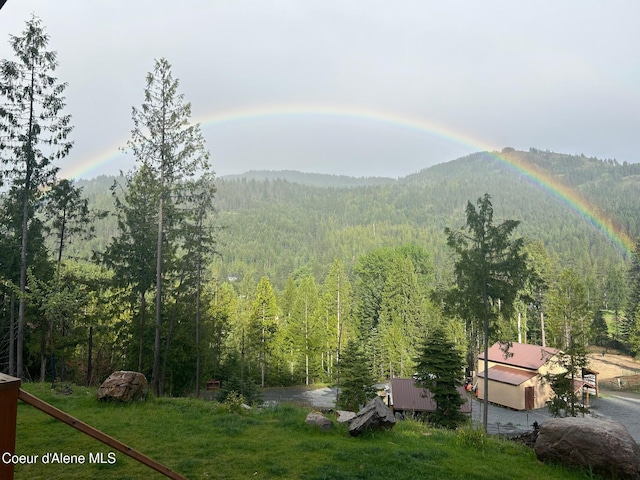 1446 Sagle Creek Rd, Sagle, ID 83860 - view of mountain background with a heavily wooded area