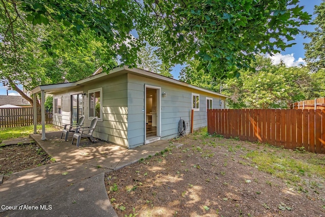 1611 E Birch St, Coeur Dalene, ID 83814 - view of outdoor structure with a fenced backyard