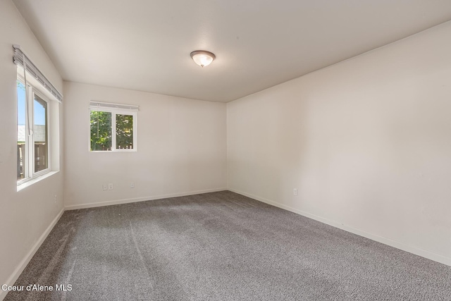 1611 E Birch St, Coeur Dalene, ID 83814 - unfurnished room with carpet floors and baseboards
