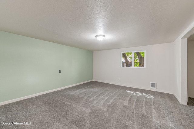 1611 E Birch St, Coeur Dalene, ID 83814 - unfurnished room with a textured ceiling, carpet, and baseboards