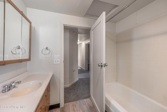 1611 E Birch St, Coeur Dalene, ID 83814 - bathroom with wood finished floors and vanity