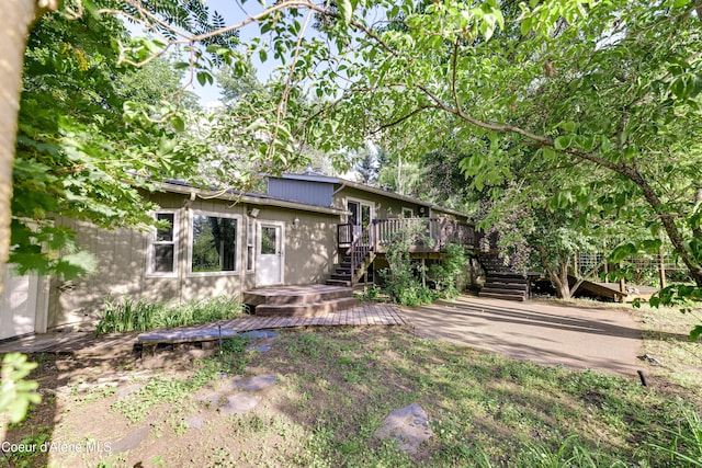 3809 N Moccasin Rd, Coeur Dalene, ID 83815 - rear view of house featuring a deck and stairs