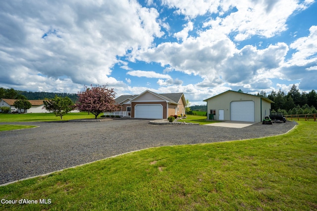 30587 S Sunray Trl, Worley, ID 83876 - view of front facade featuring an outdoor structure and a detached garage