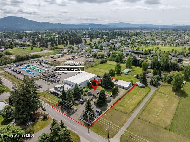 2720 Hayden Ave, Hayden, ID 83835 - aerial overview of property's location with property parcel outlined and a mountainous background
