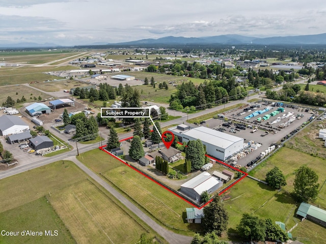 2720 Hayden Ave, Hayden, ID 83835 - aerial view of property and surrounding area featuring property boundaries highlighted and mountains