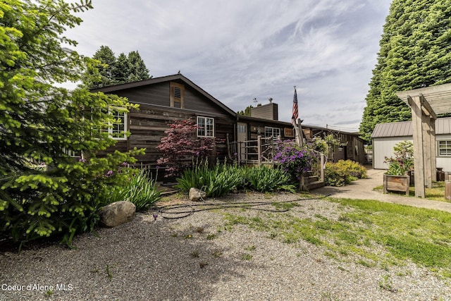 2720 Hayden Ave, Hayden, ID 83835 - view of property exterior featuring a chimney