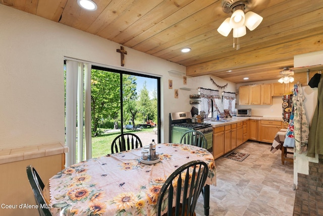 910 Otts Rd, Sagle, ID 83860 - dining area with recessed lighting, ceiling fan, stone finish floors, and wood ceiling