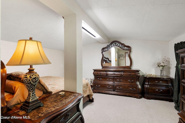 910 Otts Rd, Sagle, ID 83860 - bedroom with carpet flooring, a textured ceiling, and lofted ceiling