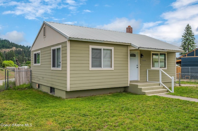2016 N 7th St, Coeur Dalene, ID 83814 - bungalow-style home featuring a chimney and metal roof