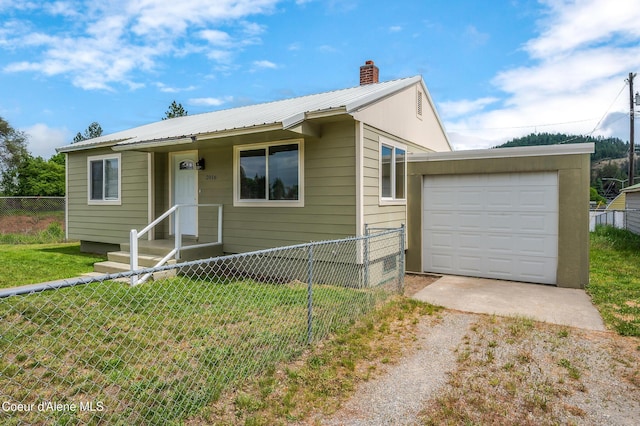 2016 N 7th St, Coeur Dalene, ID 83814 - ranch-style home featuring dirt driveway, a chimney, and metal roof