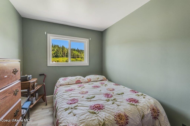 25024 N Derting Rd, Hayden, ID 83835 - bedroom featuring wood finished floors