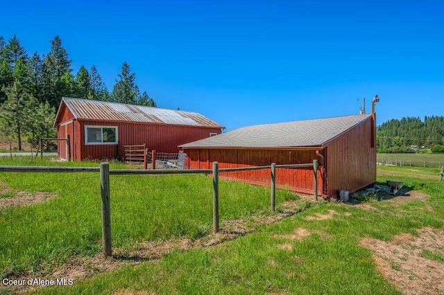 25024 N Derting Rd, Hayden, ID 83835 - back of property with a pole building, an outbuilding, and an exterior structure