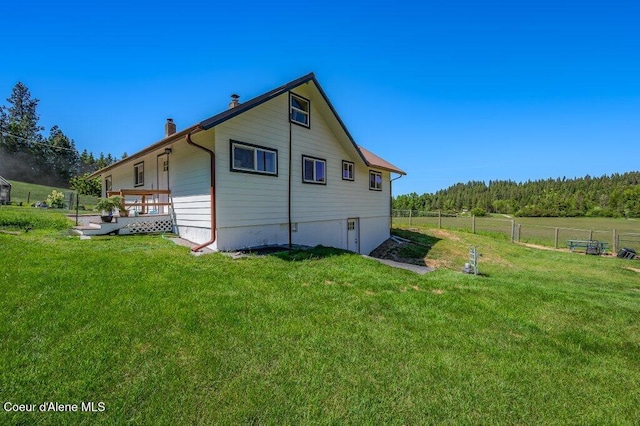 25024 N Derting Rd, Hayden, ID 83835 - view of home's exterior with a chimney