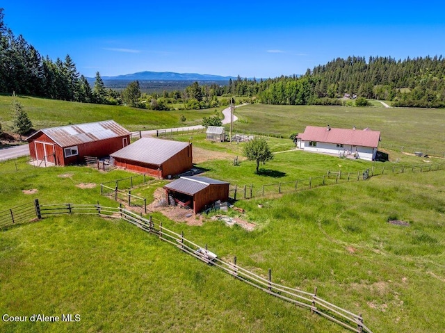 25024 N Derting Rd, Hayden, ID 83835 - aerial view of sparsely populated area with agricultural land and a mountainous background