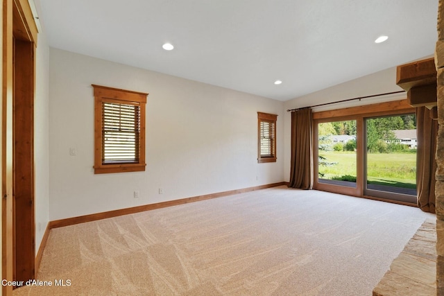 409 N Idaho Club Dr, Sandpoint, ID 83864 - spare room featuring plenty of natural light, light colored carpet, baseboards, and recessed lighting