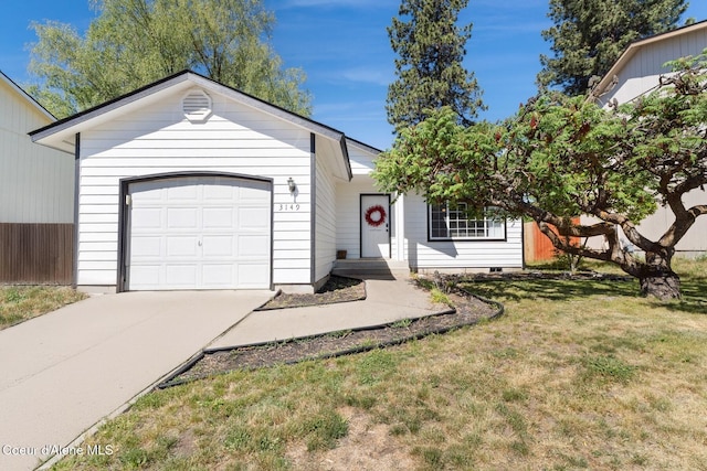 3149 N 12th St, Coeur Dalene, ID 83814 - single story home featuring a front yard, concrete driveway, and an attached garage