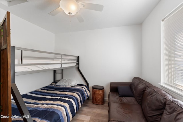 3149 N 12th St, Coeur Dalene, ID 83814 - bedroom with wood finished floors, a ceiling fan, and baseboards