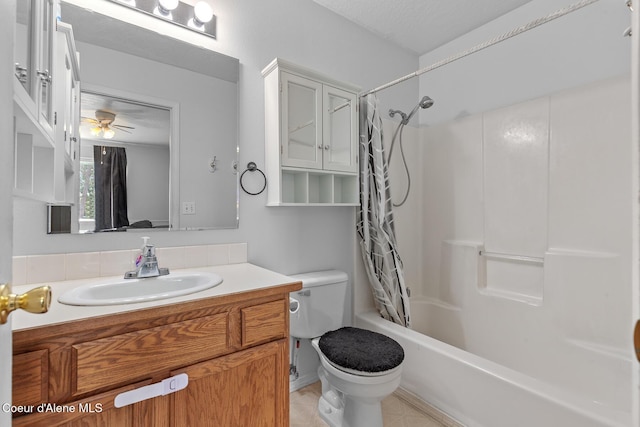6687 W Flagstaff St, Rathdrum, ID 83858 - full bath with toilet, shower / bath combo, vanity, ceiling fan, and tile patterned floors