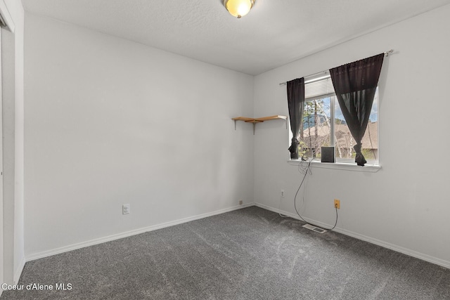 6687 W Flagstaff St, Rathdrum, ID 83858 - carpeted spare room featuring baseboards