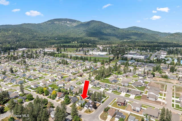 6687 W Flagstaff St, Rathdrum, ID 83858 - view of property location featuring mountains, a forest, and nearby suburban area