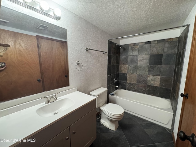 8309 N Vantage Dr, Hayden, ID 83835 - full bath featuring a textured wall, a textured ceiling, vanity, toilet, and tub / shower combination