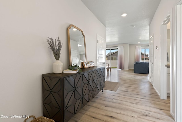 3062 N Coco St, Post Falls, ID 83854 - hallway featuring light wood-type flooring, recessed lighting, and baseboards