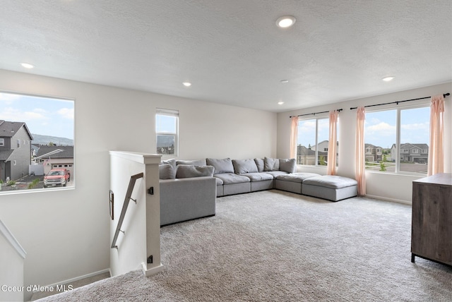 3062 N Coco St, Post Falls, ID 83854 - carpeted living room featuring recessed lighting, a textured ceiling, and a residential view