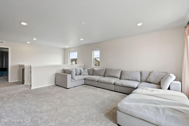 3062 N Coco St, Post Falls, ID 83854 - carpeted living area featuring recessed lighting and baseboards