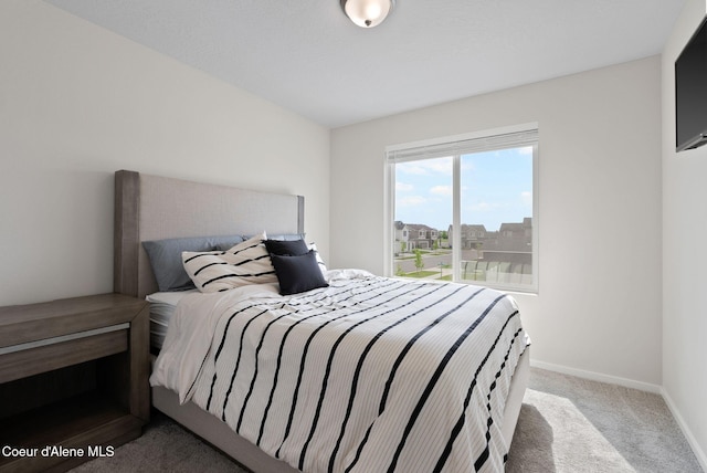 3062 N Coco St, Post Falls, ID 83854 - carpeted bedroom featuring baseboards