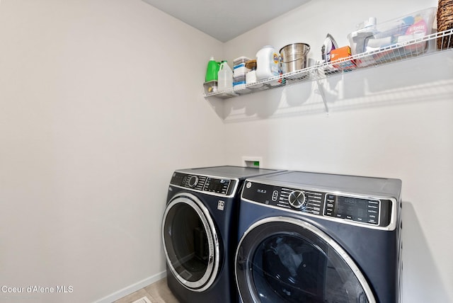 3062 N Coco St, Post Falls, ID 83854 - washroom featuring washing machine and clothes dryer and baseboards