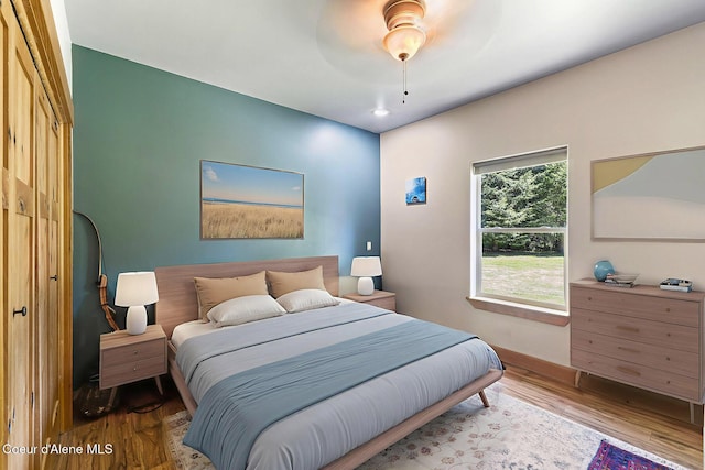 25400 N Lantern Hill Rd, Rathdrum, ID 83858 - bedroom with wood finished floors and ceiling fan