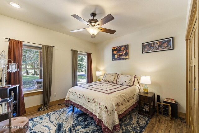 25400 N Lantern Hill Rd, Rathdrum, ID 83858 - bedroom featuring wood finished floors and ceiling fan
