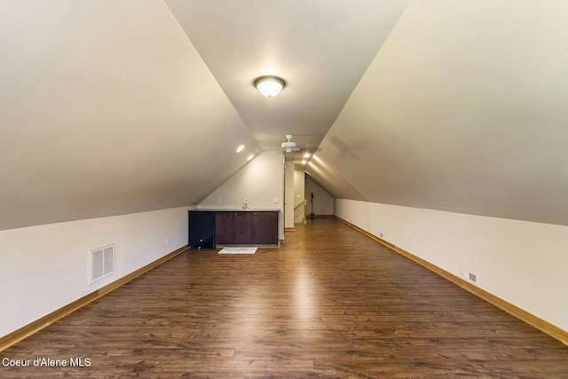 25400 N Lantern Hill Rd, Rathdrum, ID 83858 - additional living space featuring dark wood-style flooring and lofted ceiling