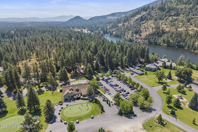25400 N Lantern Hill Rd, Rathdrum, ID 83858 - aerial view of property and surrounding area featuring a forest and a water and mountain view