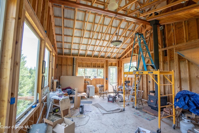 859 Otter Ln, Bonners Ferry, ID 83805 - misc room with a wood stove and vaulted ceiling