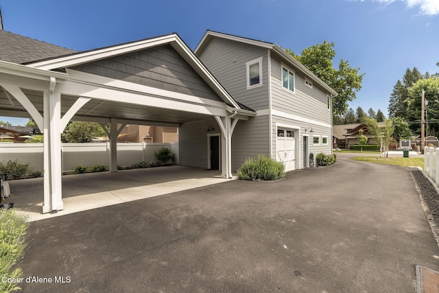 10383 N Morris Rd, Hayden Lake, ID 83835 - view of front facade with asphalt driveway and a garage
