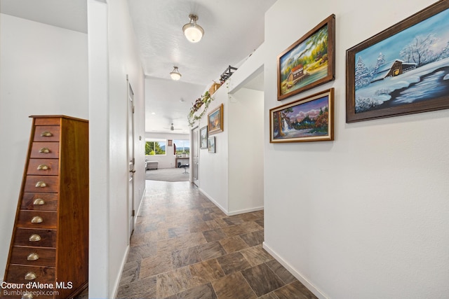 4281 N Shelburne Loop, Post Falls, ID 83854 - hall with stone finish floors and baseboards