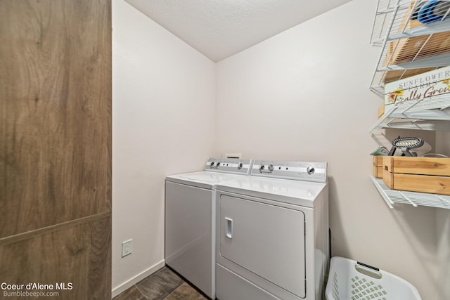 4281 N Shelburne Loop, Post Falls, ID 83854 - washroom featuring independent washer and dryer and baseboards