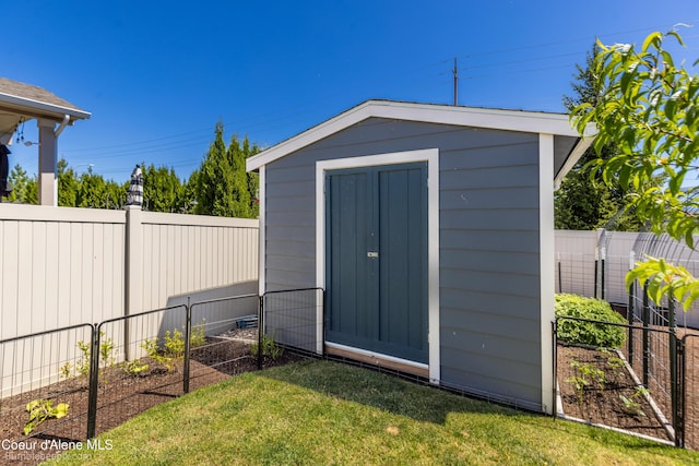 4281 N Shelburne Loop, Post Falls, ID 83854 - view of shed with a vegetable garden