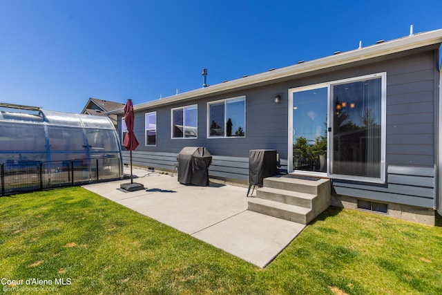 4281 N Shelburne Loop, Post Falls, ID 83854 - back of property with a patio
